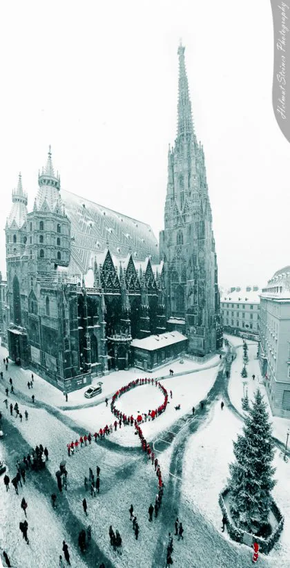 Flashmob: People building a Red Ribbon at the Stephansplatz beside the Stephansdom