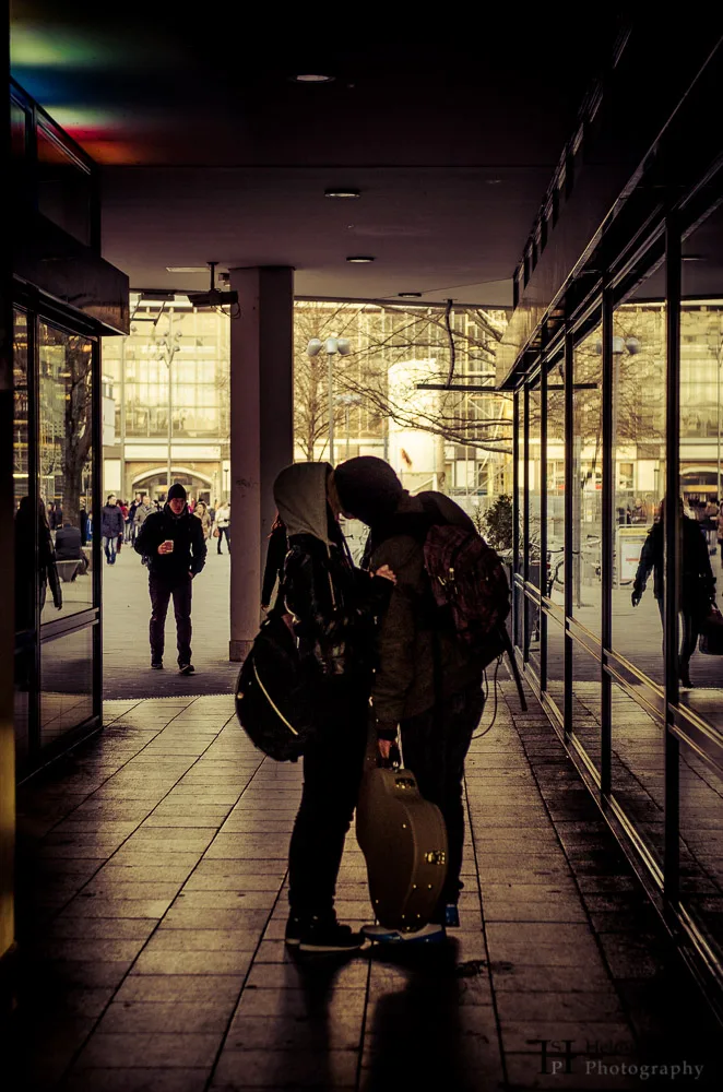 Young couple kissing in the streets of Berlin